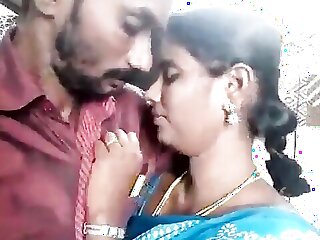 Desi aunt in Tamil kissing display